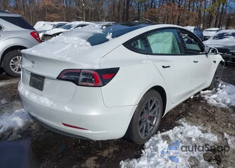 2021 Tesla Model 3 Standard Range Plus Rear-Wheel Drive from USA, damaged, VIN 5YJ3E1EA7MF855078
